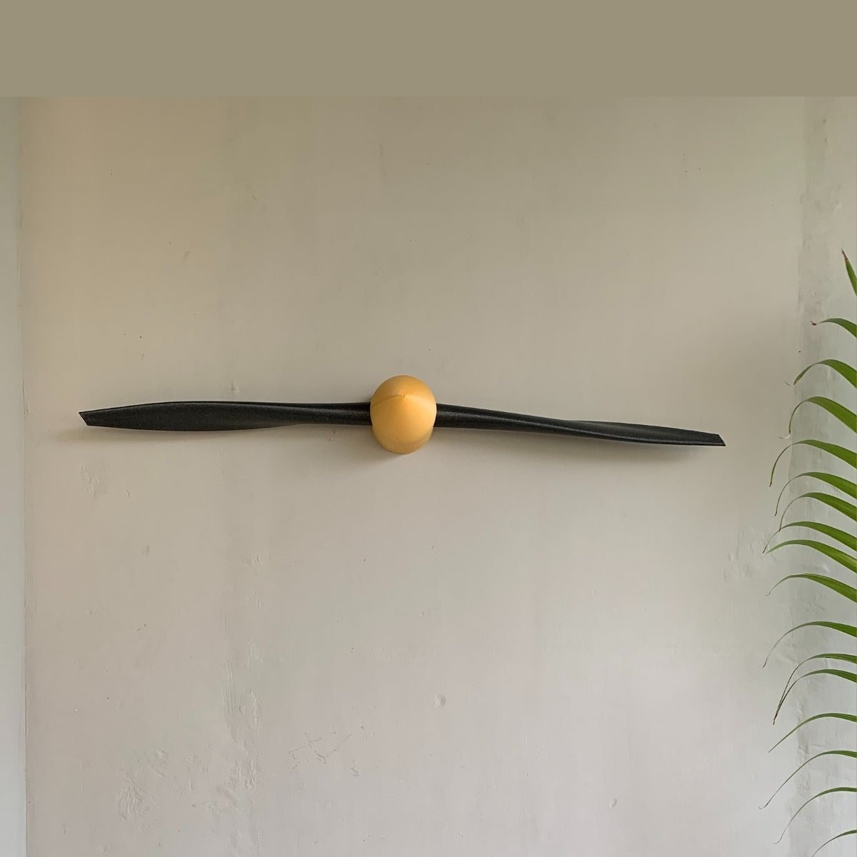 Allegiant Propeller Plant - Based Black & Gold Wall Decor – Home Decor on Brown Living™. SKU: ALPREDPLTKA086. Img 1.