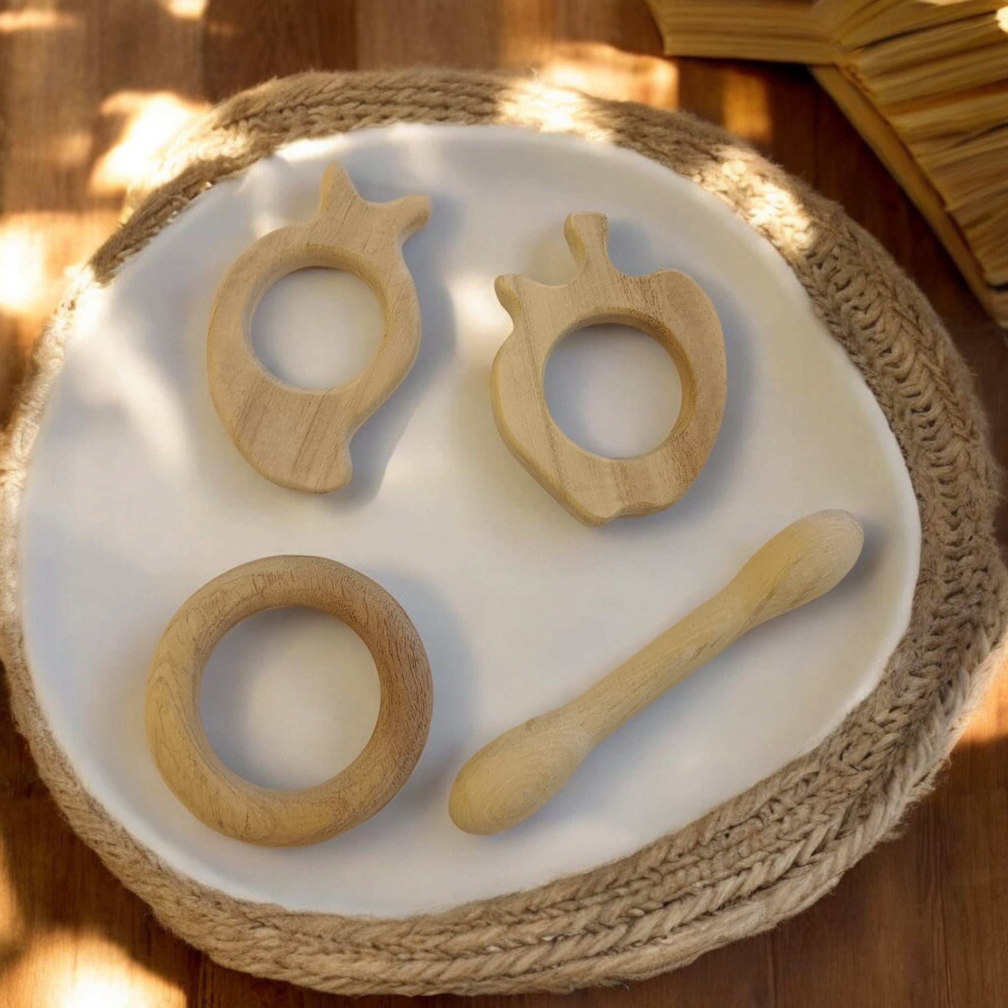 Baby Neem Wooden Teethers – Apple, Mango, Dumbbell & Ring Shapes – Baby Teethers & Soothers on Brown Living™. SKU: T_APL-MNG-DBL-RNG. Img 1.