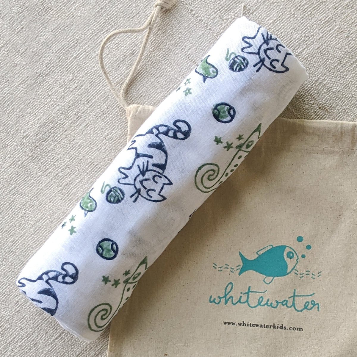 Baby Organic Cotton Swaddle Blanket – Baby Swaddle on Brown Living™. SKU: KOI - MNT - SWD. Img 6.