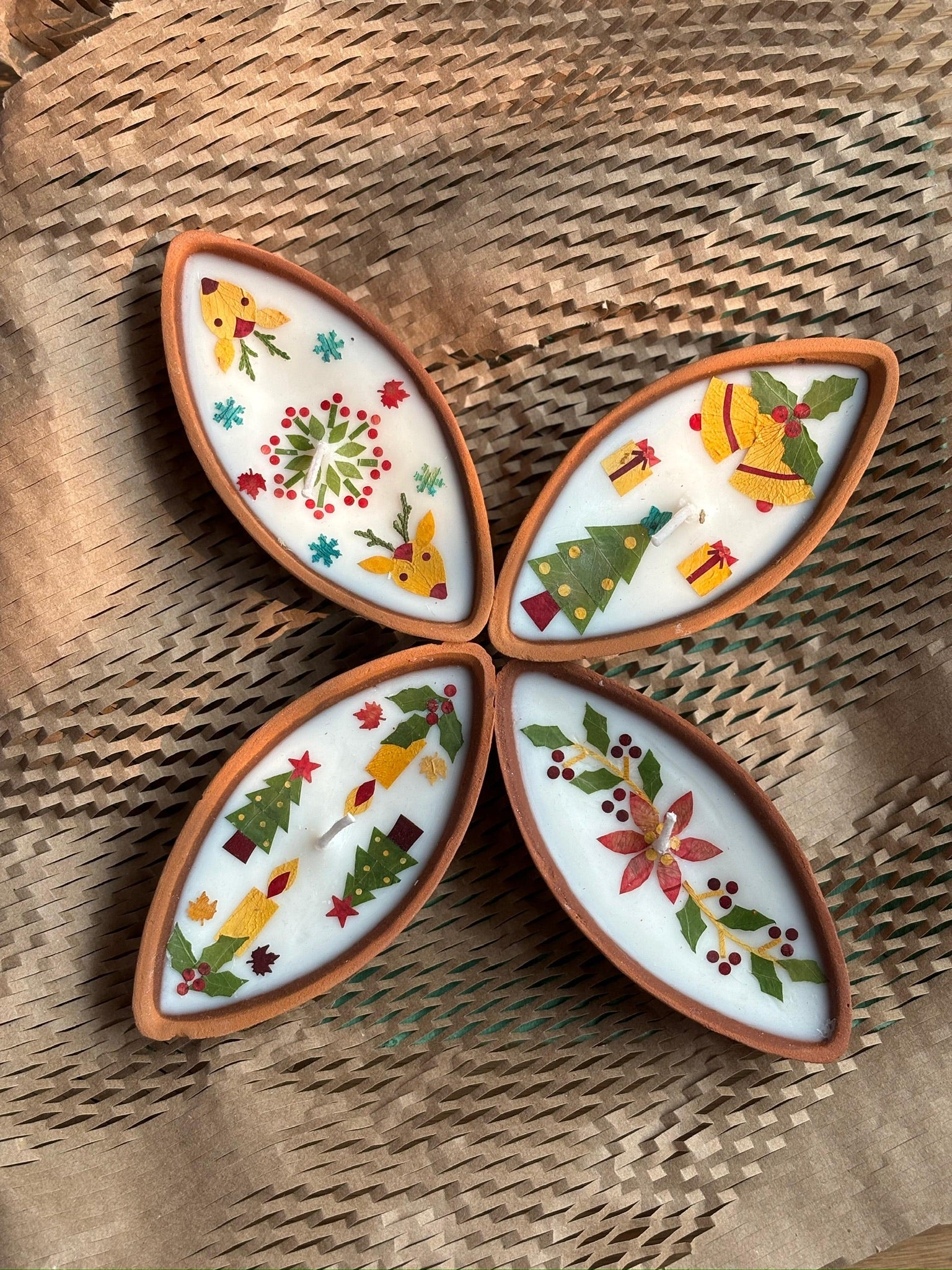 Christmas Terracotta Candles - Medium set of 4 – Candles & Fragrances on Brown Living™. SKU: GRDYA03. Img 1.