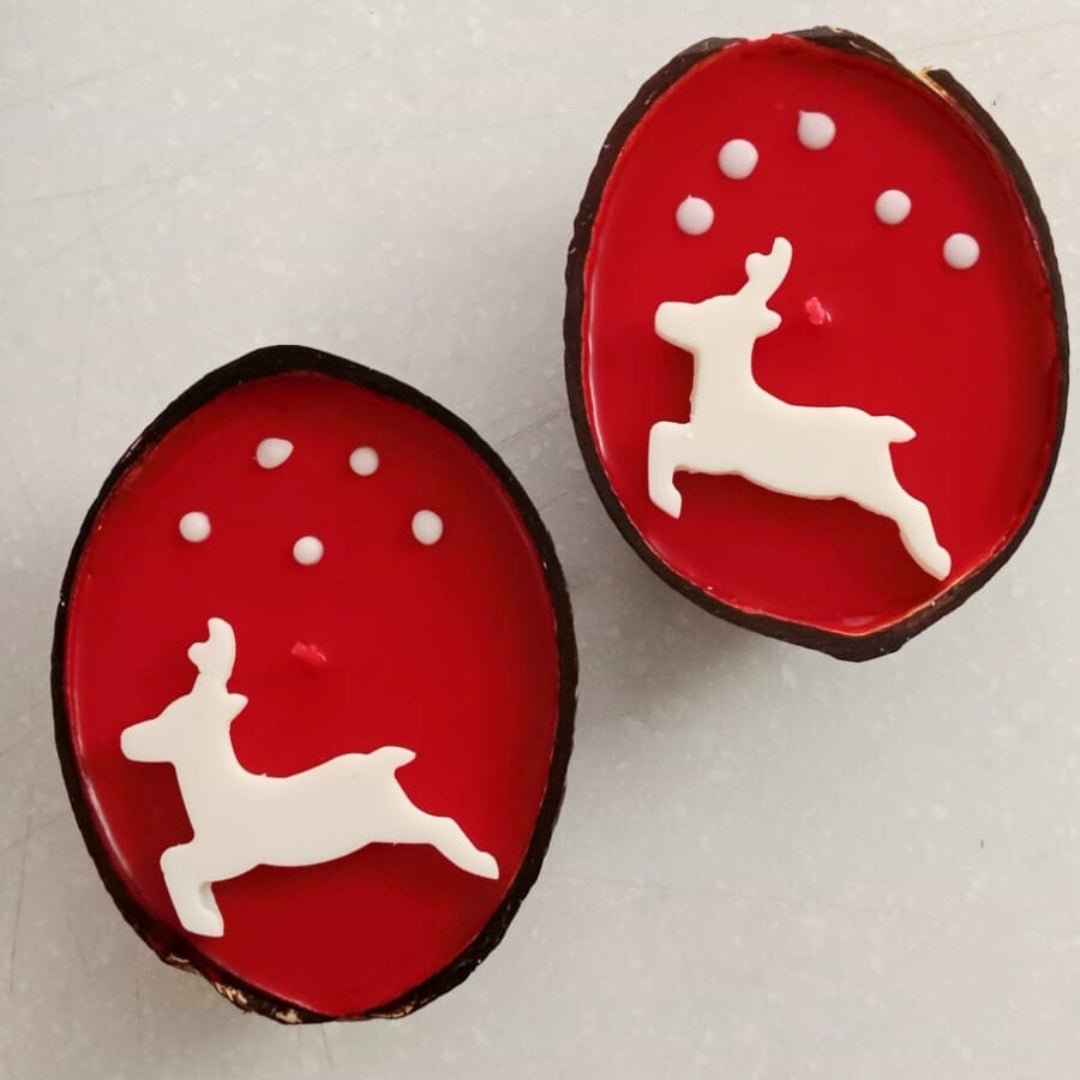 Coconut Shell Christmas Reindeer Candle Set of 2 – Candles & Fragrances on Brown Living™. SKU: TGARNDERCDLE. Img 1.