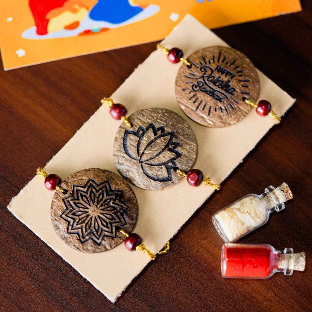 Coconut Shell Rakhi Sets - Rough (Package includes 3 Rakhis, Kumkum, Rice Grains & Raksha Bandhan Card) - Set of 3 – Rakhi on Brown Living™. SKU: TGARGHRKHI. Img 1.