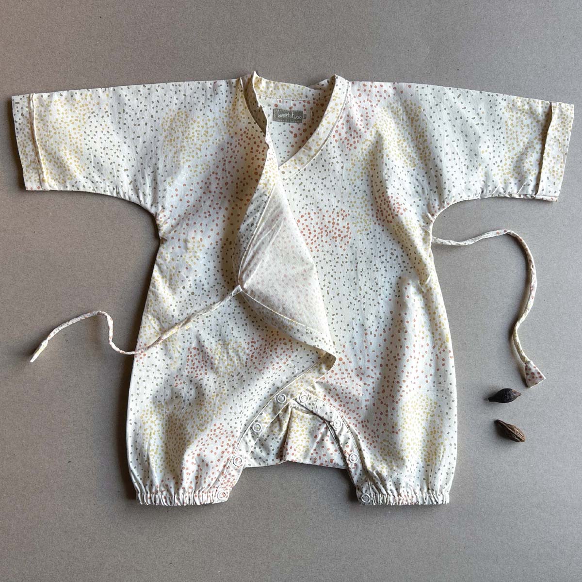 Cosmos Baby Romper – Kids Onesies on Brown Living™. SKU: AGHCOSROMPOPNB. Img 2.