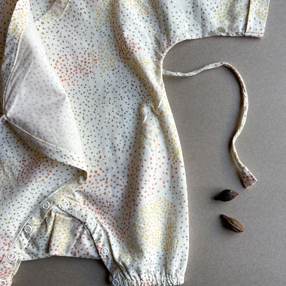 Cosmos Baby Romper – Kids Onesies on Brown Living™. SKU: AGHCOSROMPOPNB. Img 3.