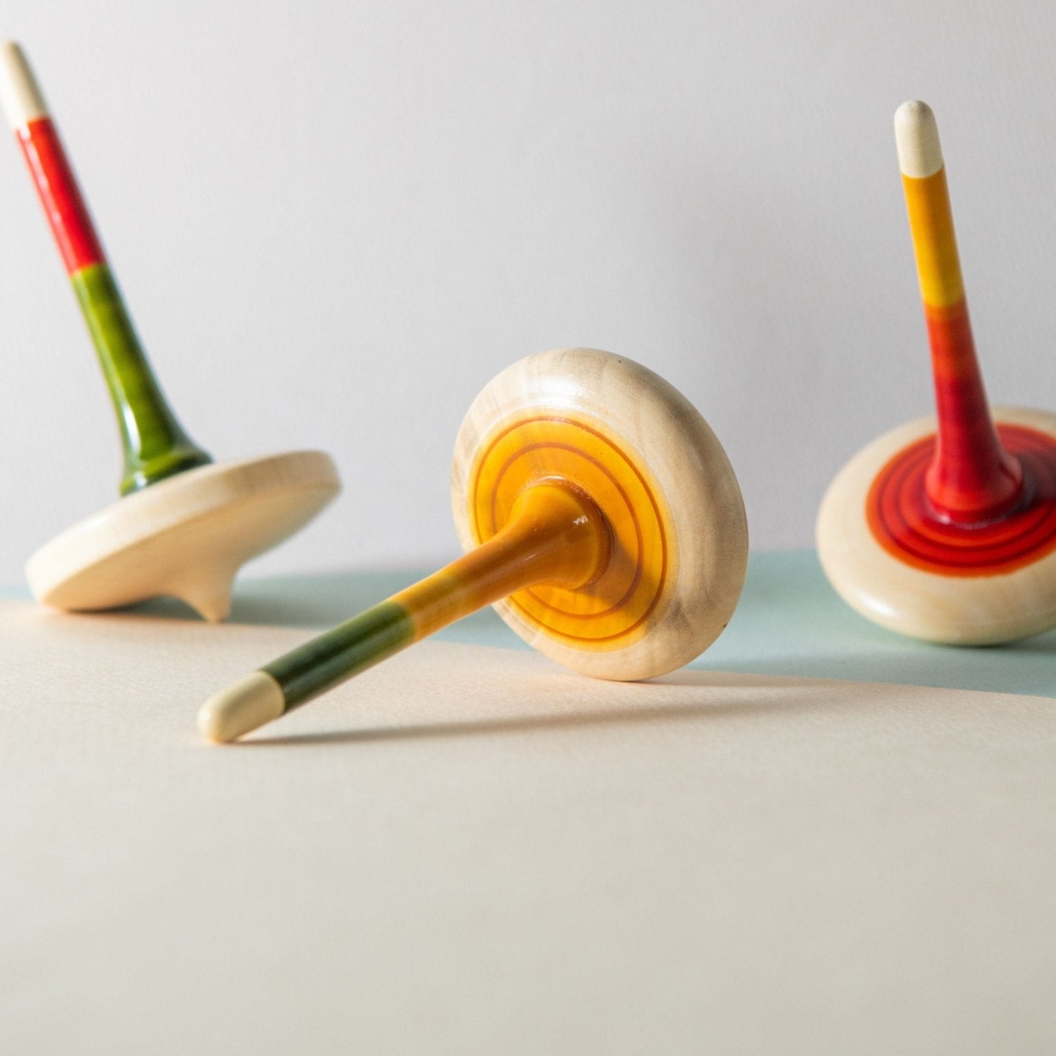 Freedom of Expression Handmade Wooden Spinning Tops (Set of 2) – Learning & Educational Toys on Brown Living™. SKU: TTOE004. Img 1.