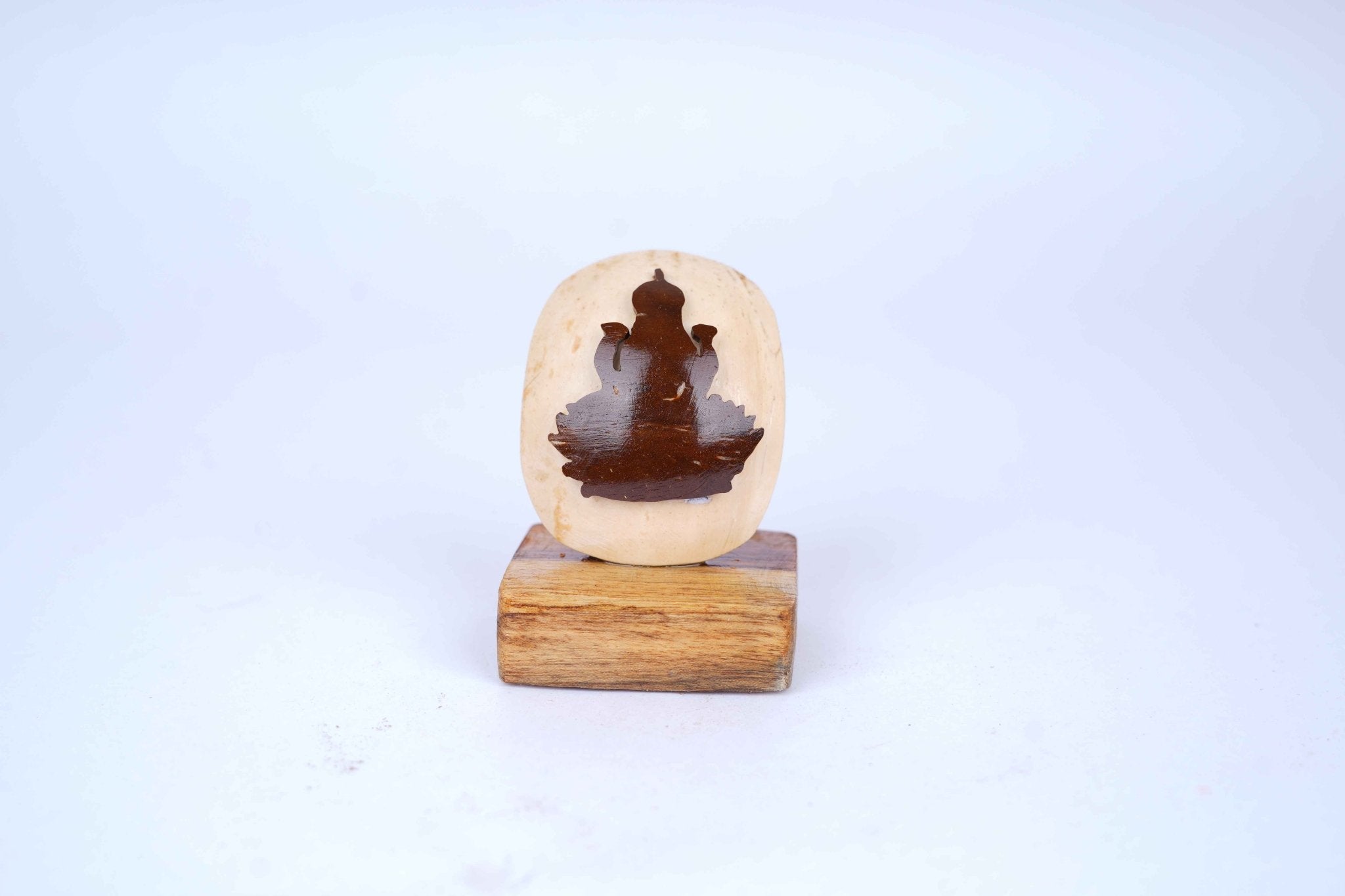 Handcrafted Lakshmi Idol | White Tender & Black Coconut Shell – Art & Craft Supplies on Brown Living™. SKU: KOTT020. Img 2.
