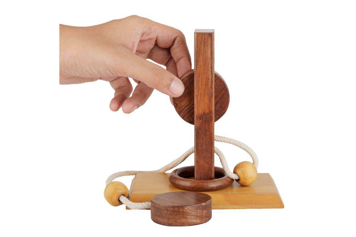 Handmade Wooden Rope and Ring Organic 3D Brain Teaser Puzzle – Learning & Educational Toys on Brown Living™. SKU: BLSC1022408. Img 1.