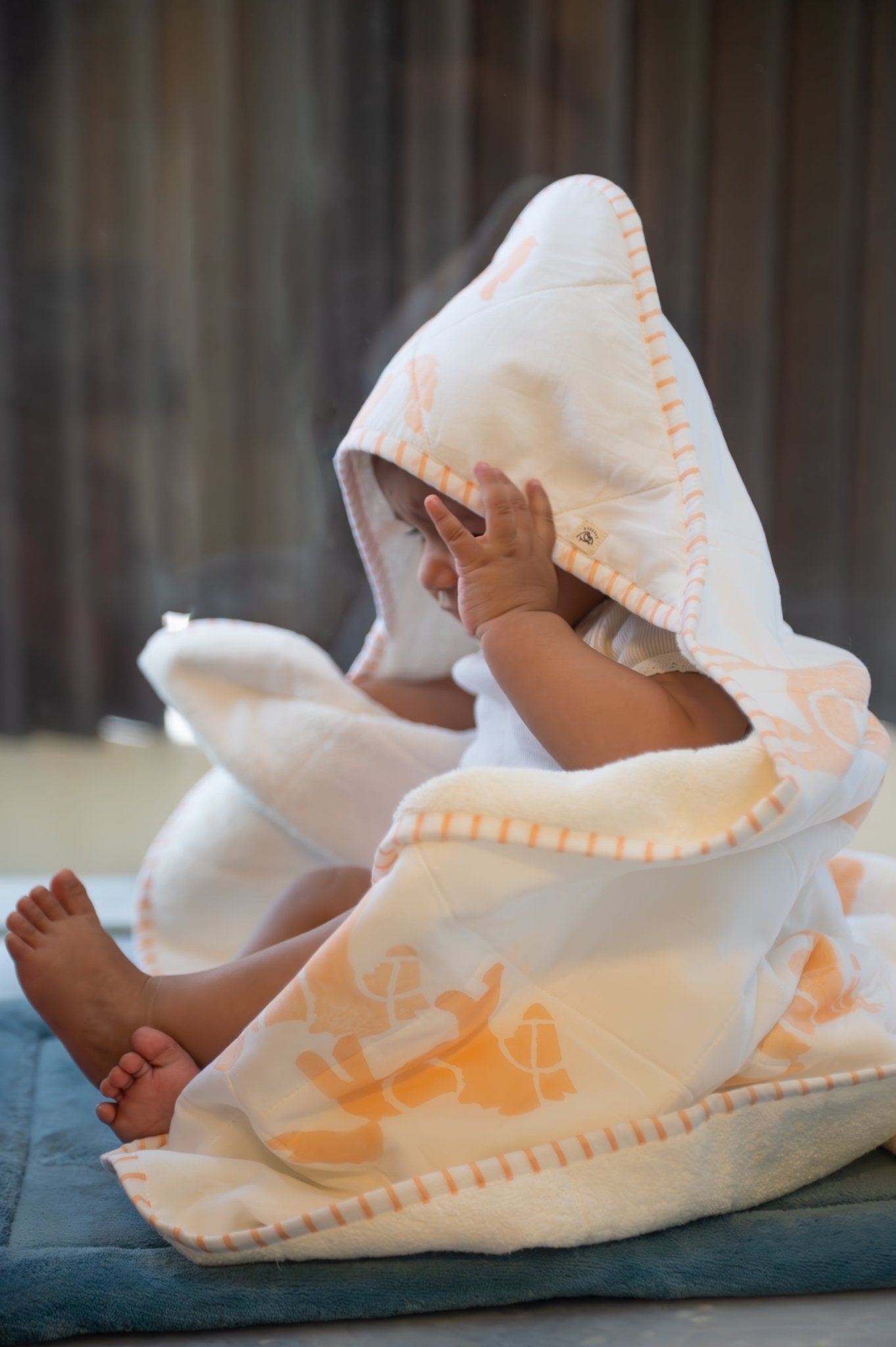 Hooded Baby & Kids Towel in Circus Peach Print – Bath Linens on Brown Living™. SKU: MSY-00431E-Peach. Img 1.