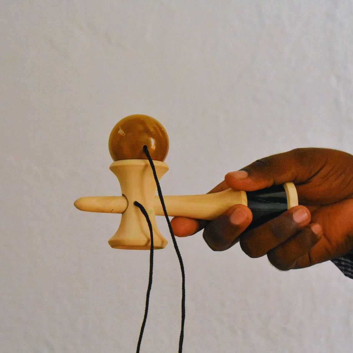 Kendama Toy Yellow | Classic Skill Toy for All Ages – Wooden Toys on Brown Living™. SKU: CD-WOO-KEN-YEL. Img 3.