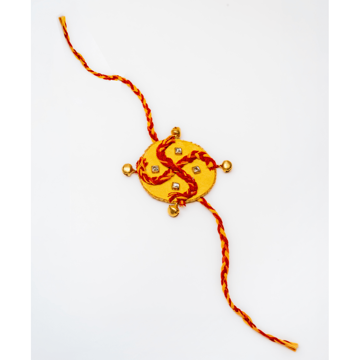 Kesar Swastik Rakhi | Handmade Auspicious Swastik Rakhi – Rakhi on Brown Living™. SKU: AM-RAK-Kesar. Img 2.