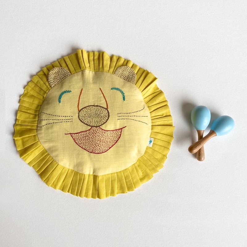 Kids Newborn Gift Set - Organic Cotton Mustard Seed Lion Pillow and Maracas – Gift Giving on Brown Living™. SKU: LON - MAR - BLU. Img 1.
