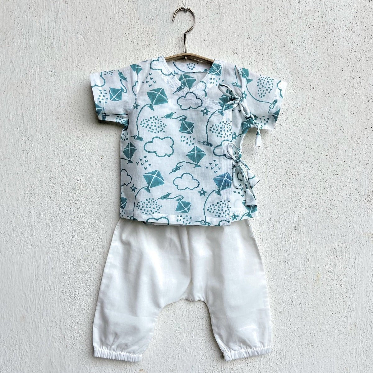 Kids Unisex Organic Cotton Patang Teal Angarakha Top and White Pants – Kids Daywear Sets on Brown Living™. SKU: PAT - TELWHT - ANGPJ - 032953. Img 1.