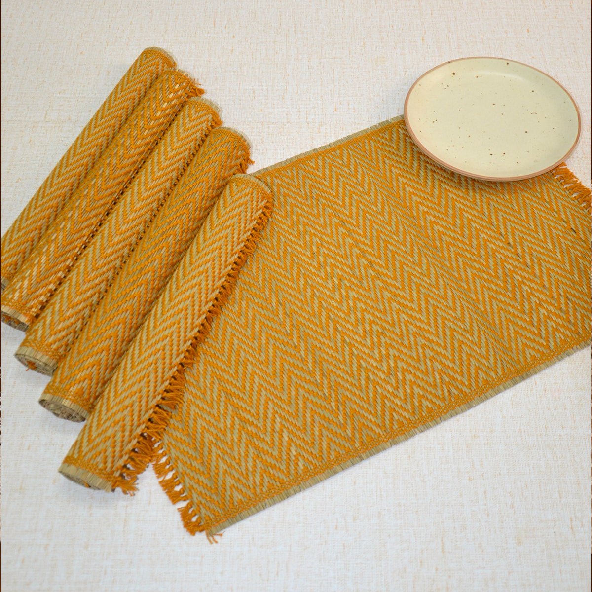 Madurkathi Chevron Tassels Placemats - Rust (Set of 6) – Table Linens by DHARINI available on Brown Living™. Mustard . SKU: MKTMAT019D. Img 7.