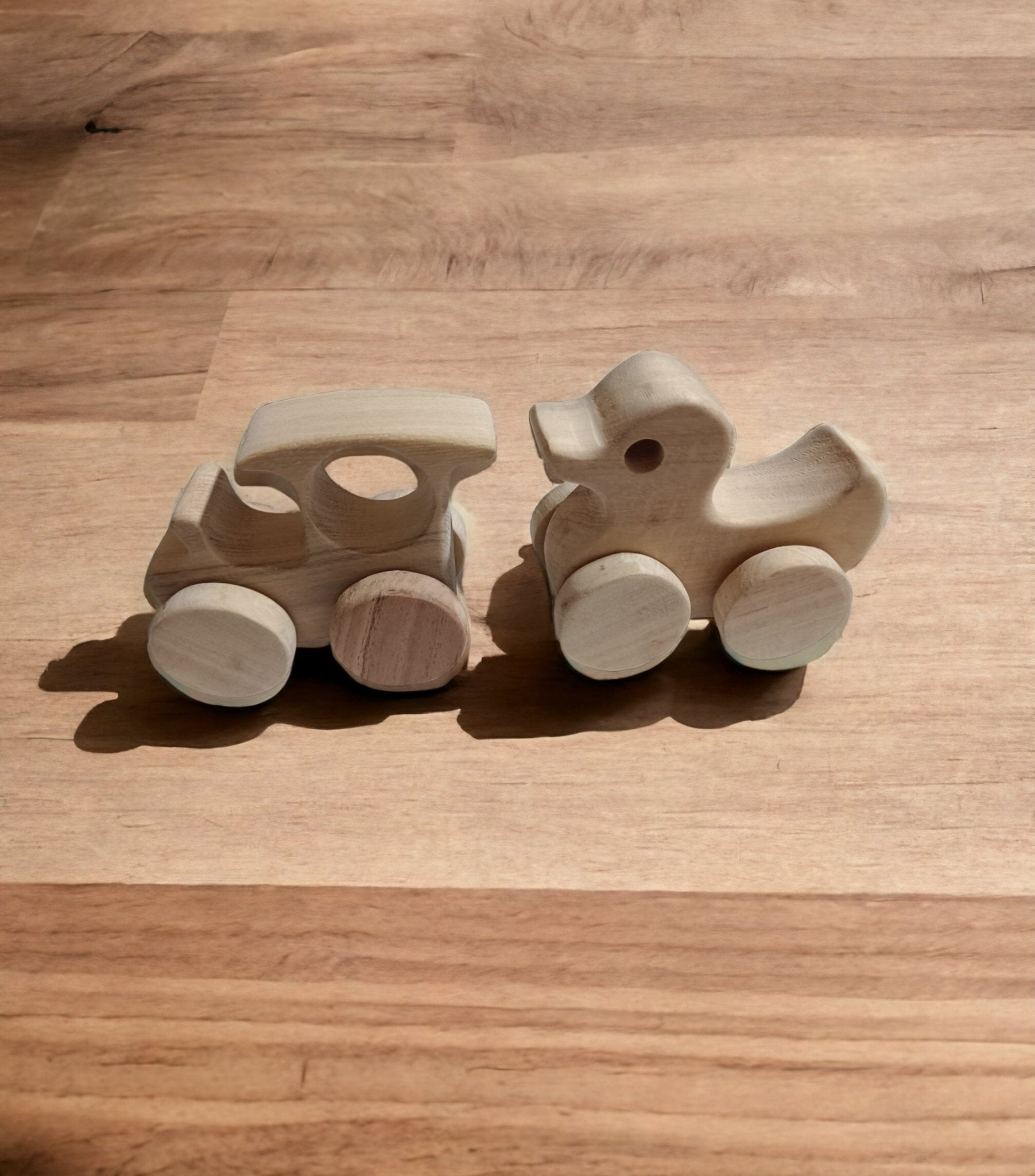 Pack Of 2 Beautiful Neem Wooden Wheel Toys – Train & Duck Shapes – Toy Trains & Vehicles on Brown Living™. SKU: W_TRN-DK. Img 4.