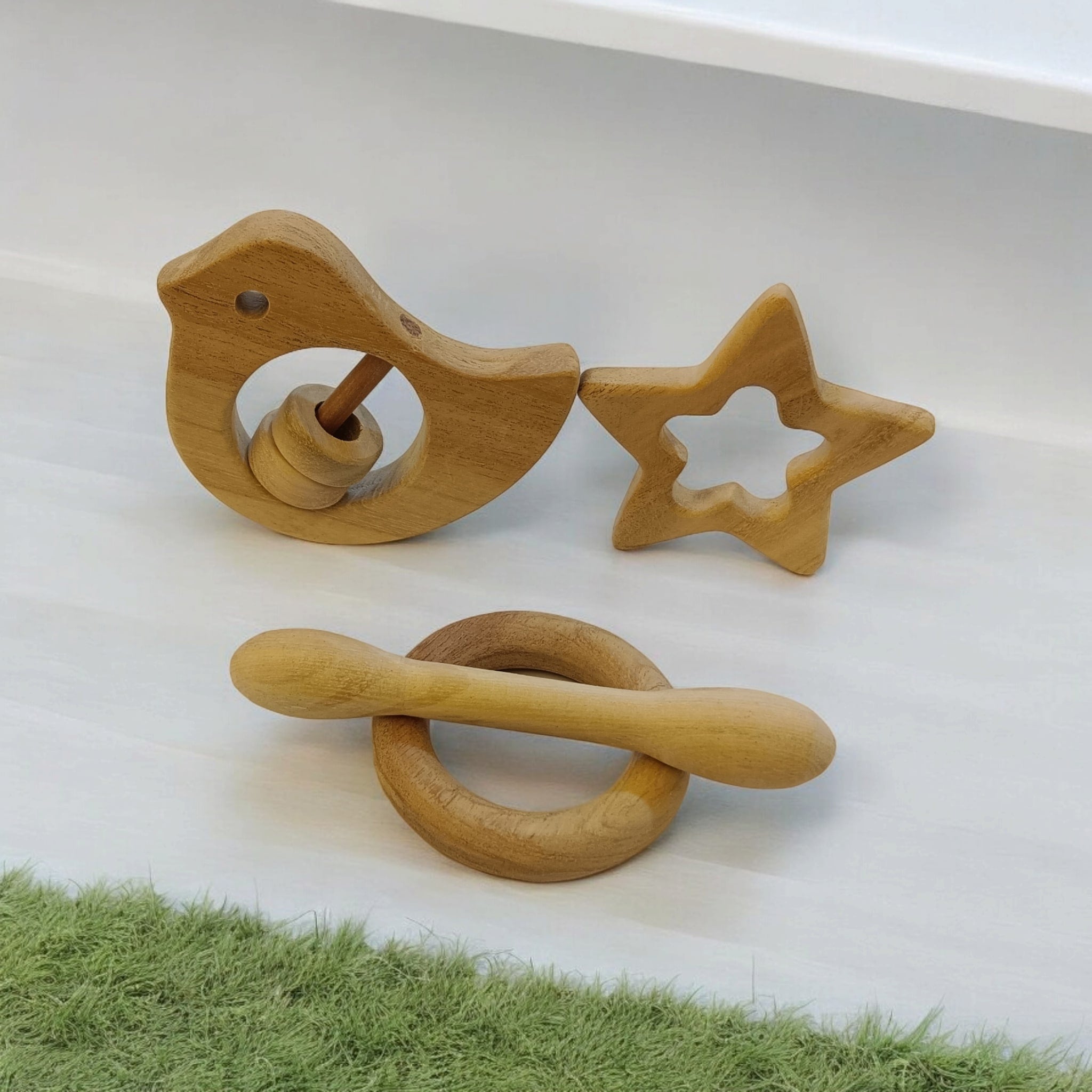 Pain Relieving Baby Rattle & Teethers Set – Wooden Toys on Brown Living™. SKU: RT_DV-DBL-STR-RNG. Img 3.