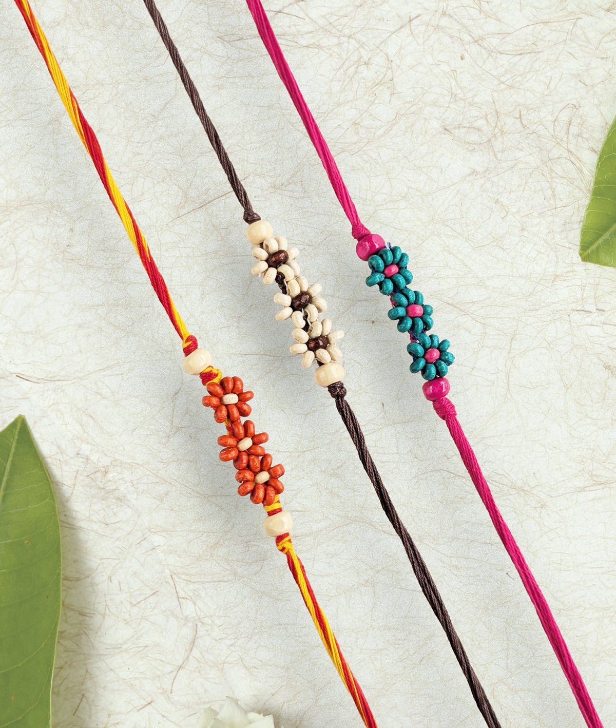 Phool Leher Rakhi - Set of 3 – Rakhi on Brown Living™. SKU: GUL-20. Img 1.