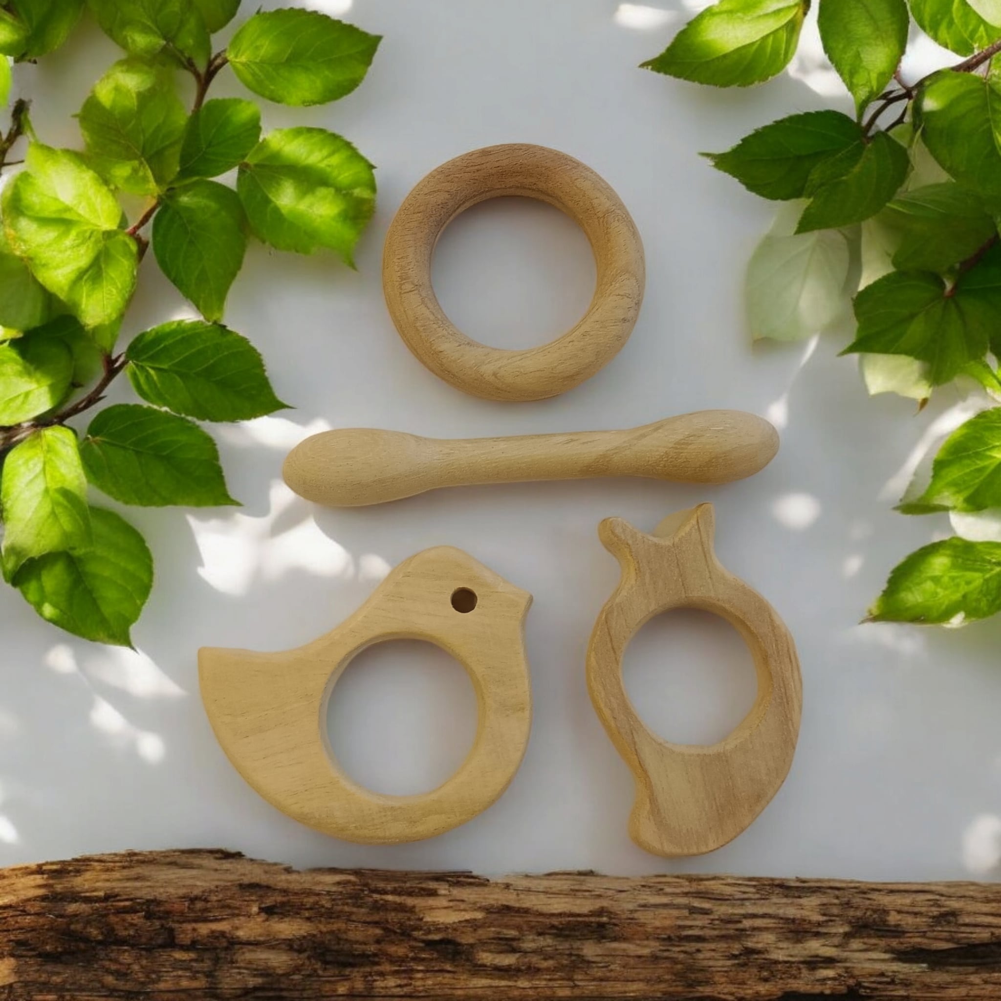 Pure Neem Wooden Teethers – Dumbbell, Ring, Mango & Dove Shapes – Baby Teethers & Soothers on Brown Living™. SKU: T_DBL-RNG-MNG-DV. Img 1.