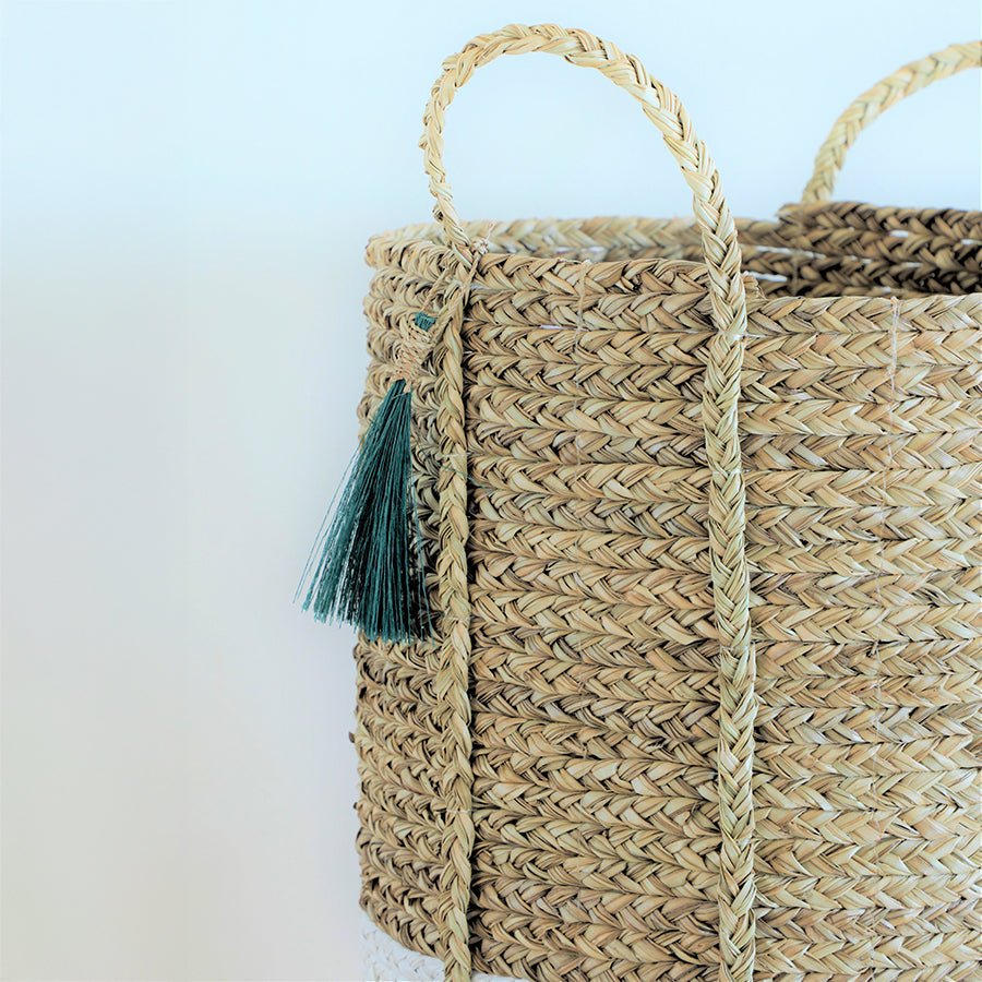 Seagrass Anthro Tassel Basket Green – Handwoven Eco Storage Basket – Home Decor on Brown Living™. SKU: AnthroTasselBasketGreenWhiteSmall. Img 6.