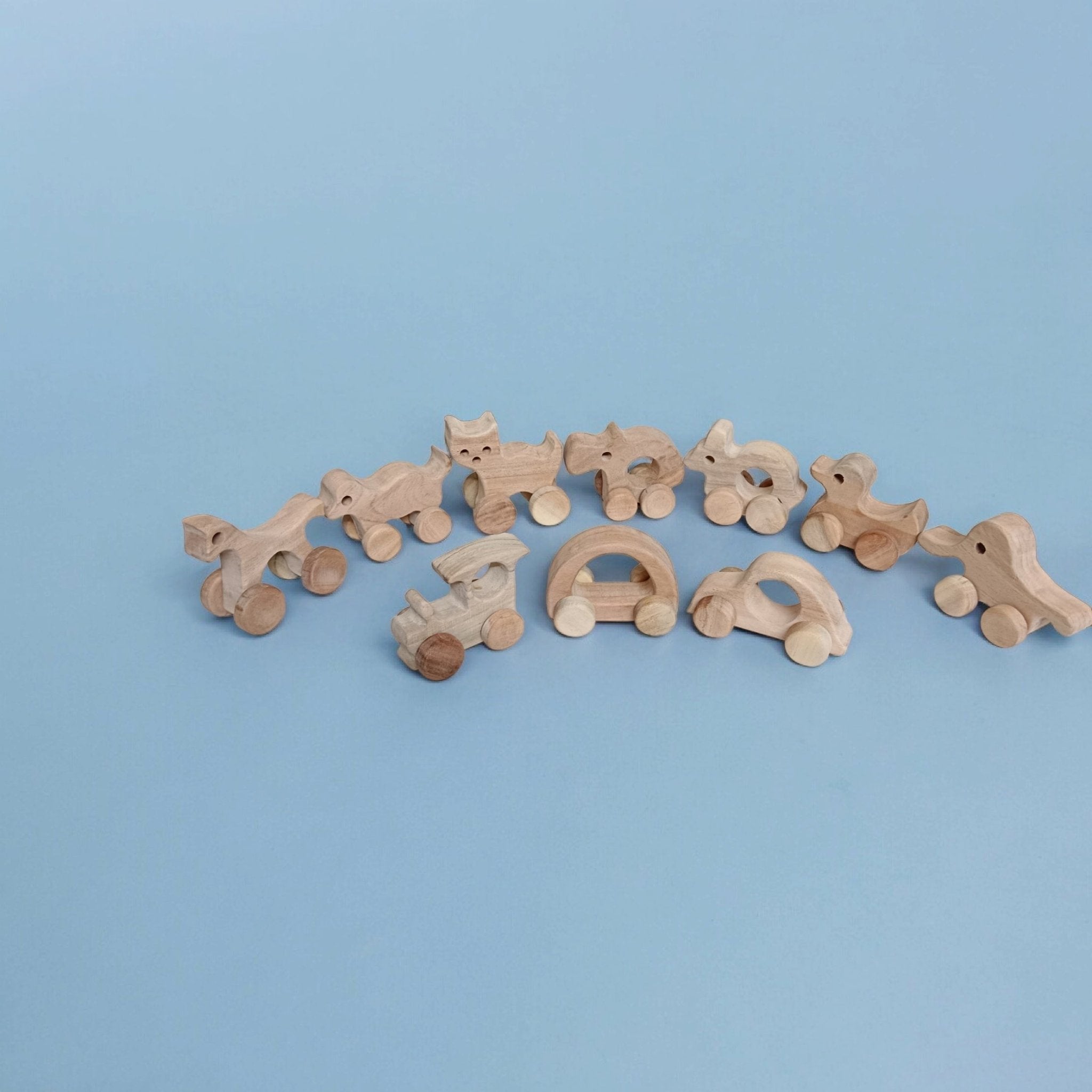 Set Of 10 Beautiful Push & Pull Toys For Toddlers – Toy Trains & Vehicles on Brown Living™. SKU: W_SET10. Img 3.