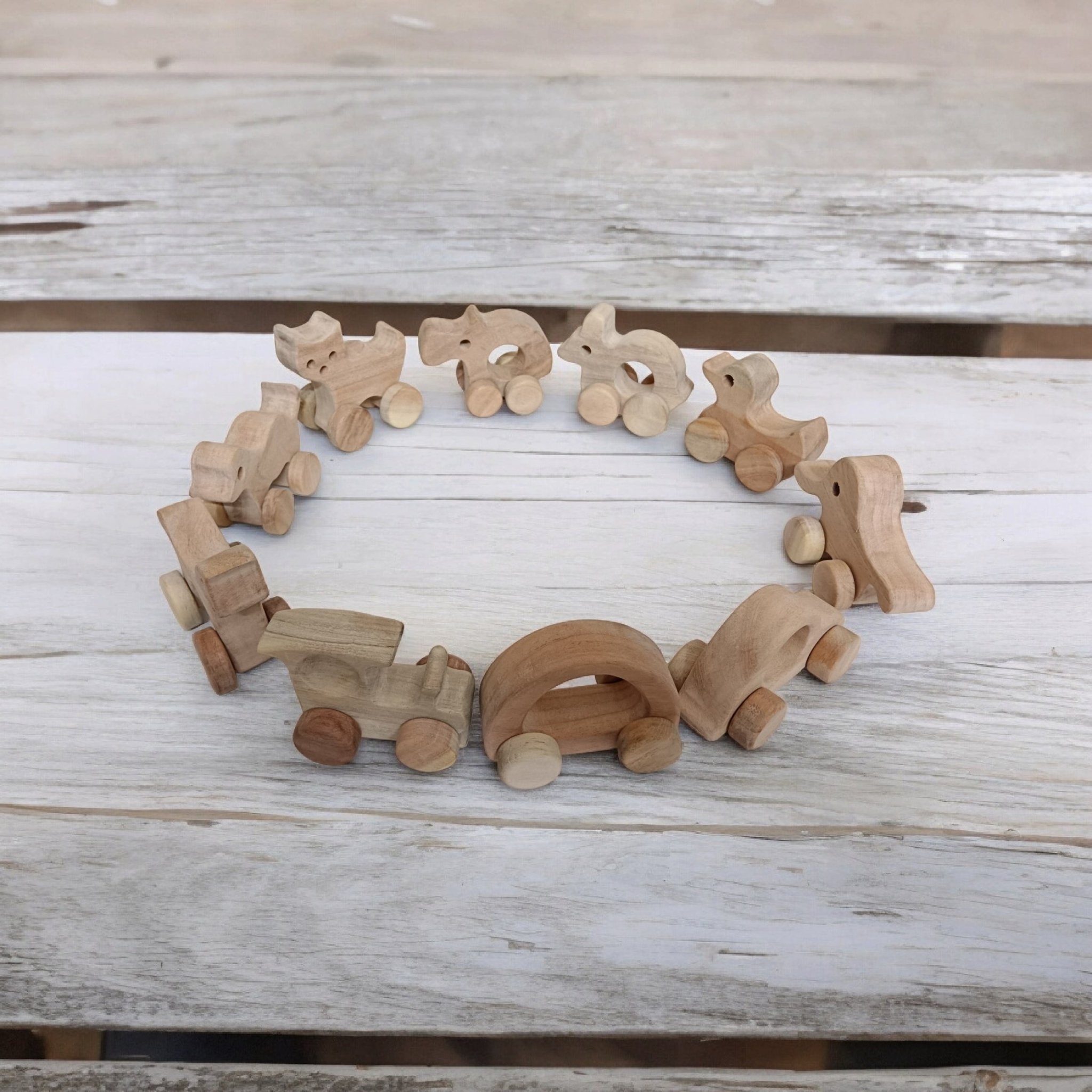 Set Of 10 Beautiful Push & Pull Toys For Toddlers – Toy Trains & Vehicles on Brown Living™. SKU: W_SET10. Img 2.