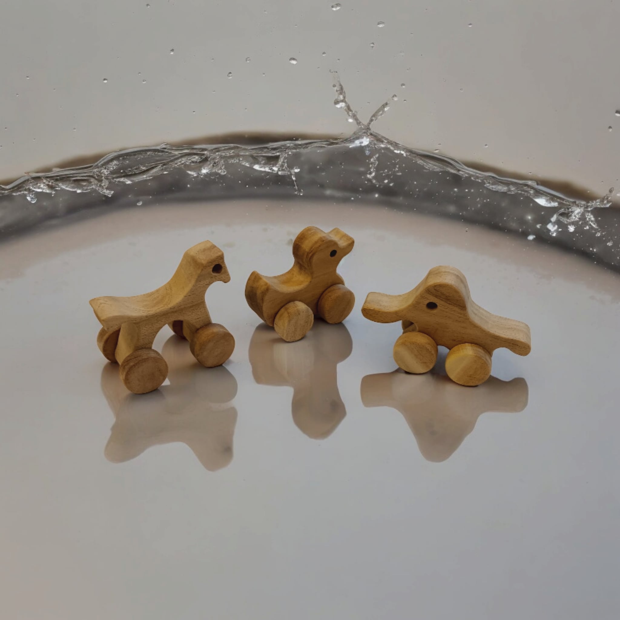 Set Of 3 Neem Wooden Wheel Toys – Horse, Elephant & Duck Shapes – Toy Trains & Vehicles on Brown Living™. SKU: W_HRS-ELP-DK. Img 4.