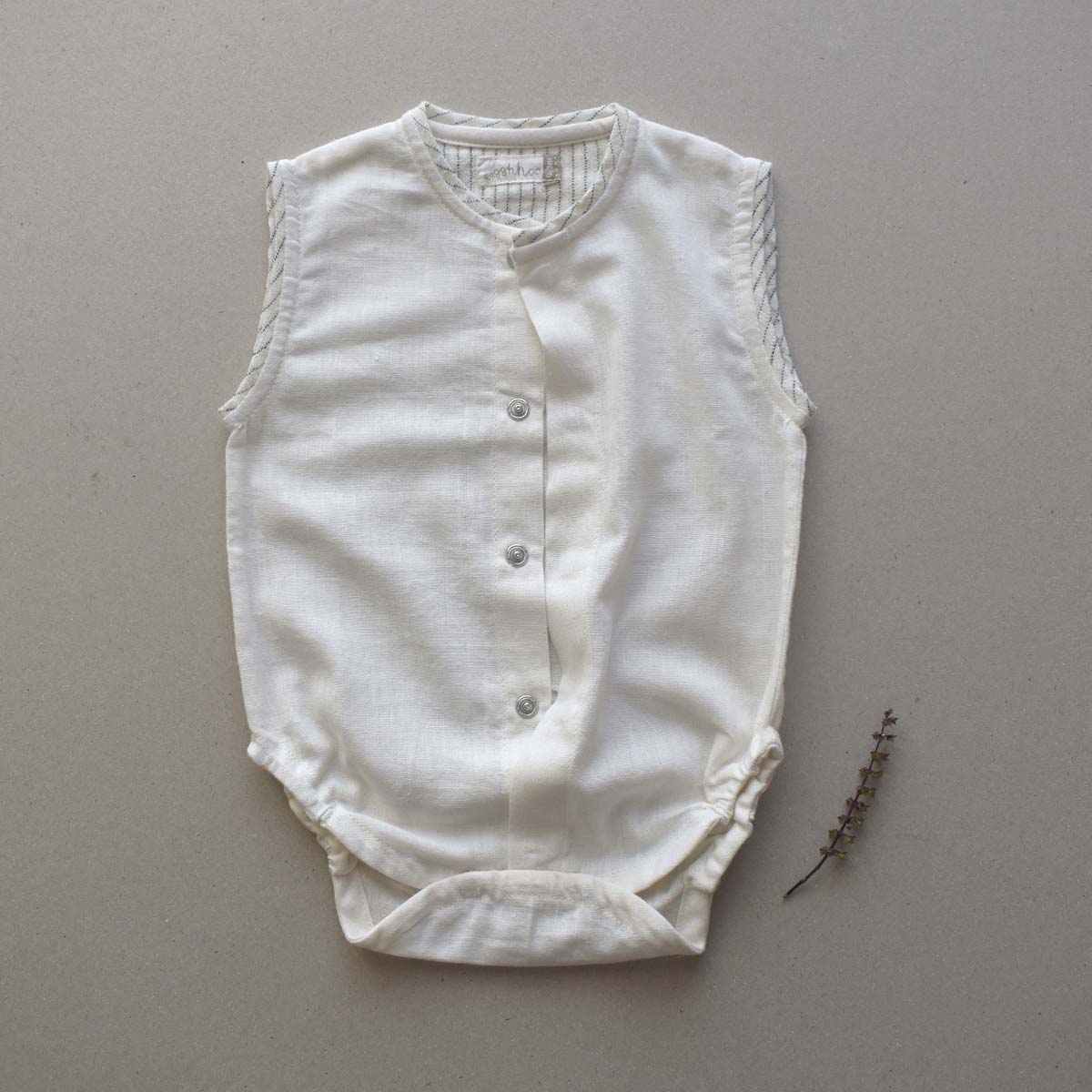 Shiroi Baby Onesie – Kids Onesies on Brown Living™. SKU: C1O00NO13NB. Img 1.