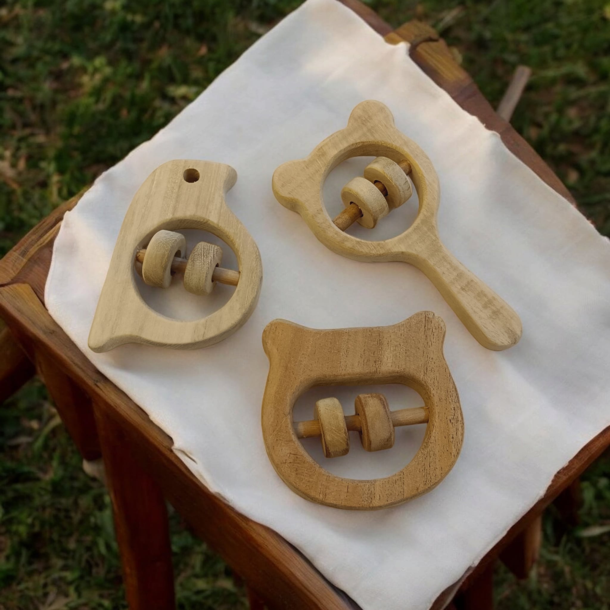 Soothing Sound Making Rattles For Toddlers – Baby Rattles on Brown Living™. SKU: R_HPHD-SPR-MKHD. Img 4.