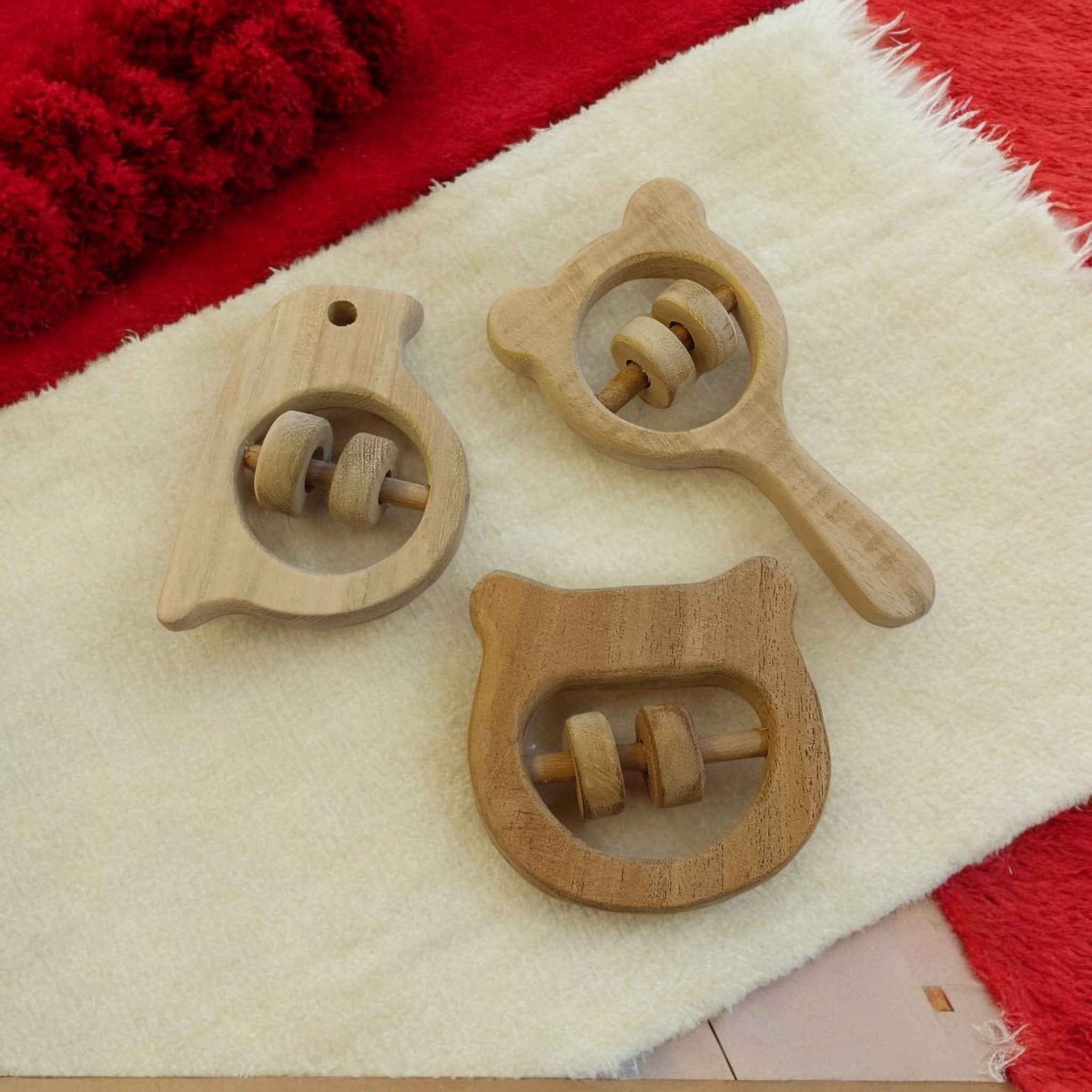 Soothing Sound Making Rattles For Toddlers – Baby Rattles on Brown Living™. SKU: R_HPHD-SPR-MKHD. Img 1.