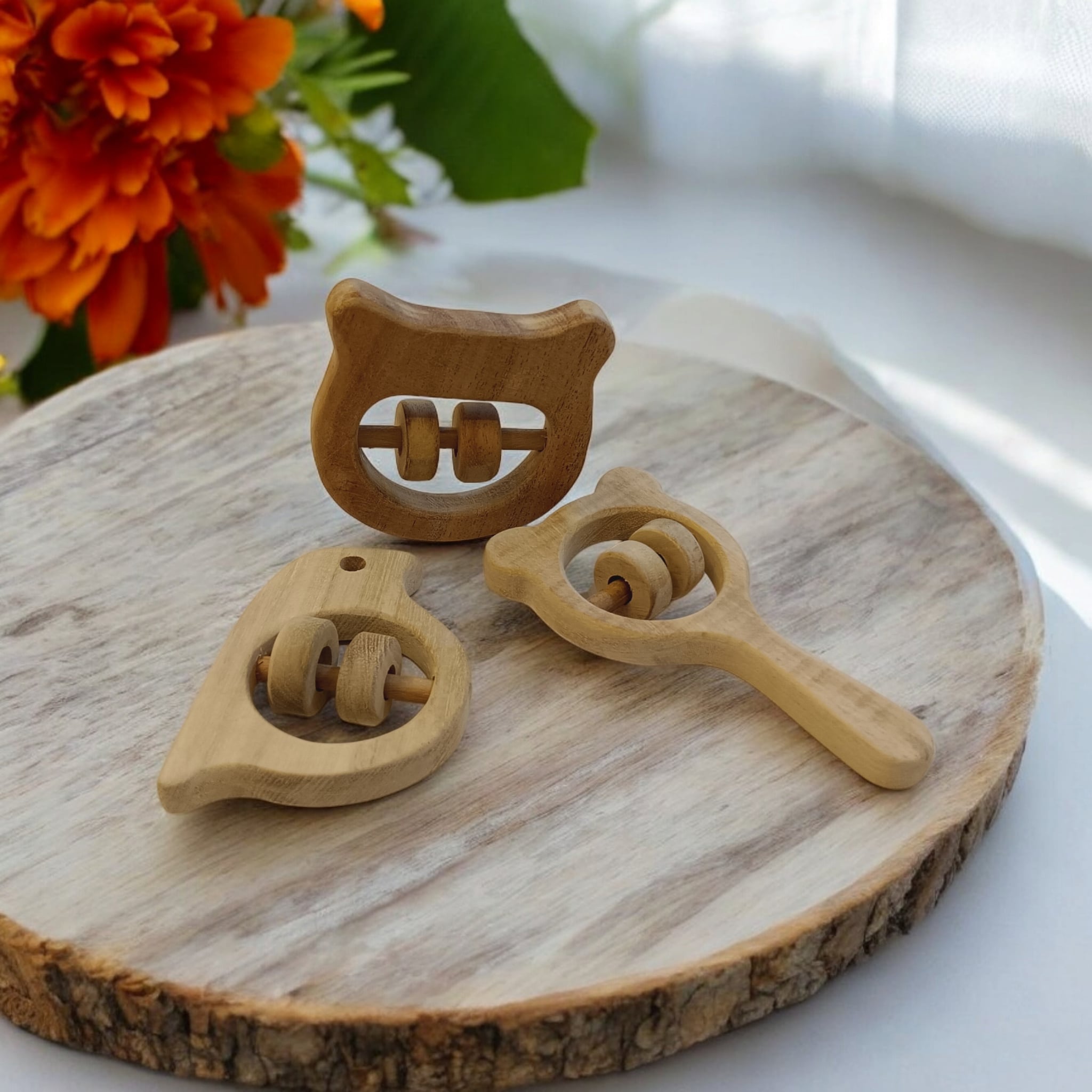 Soothing Sound Making Rattles For Toddlers – Baby Rattles on Brown Living™. SKU: R_HPHD-SPR-MKHD. Img 2.