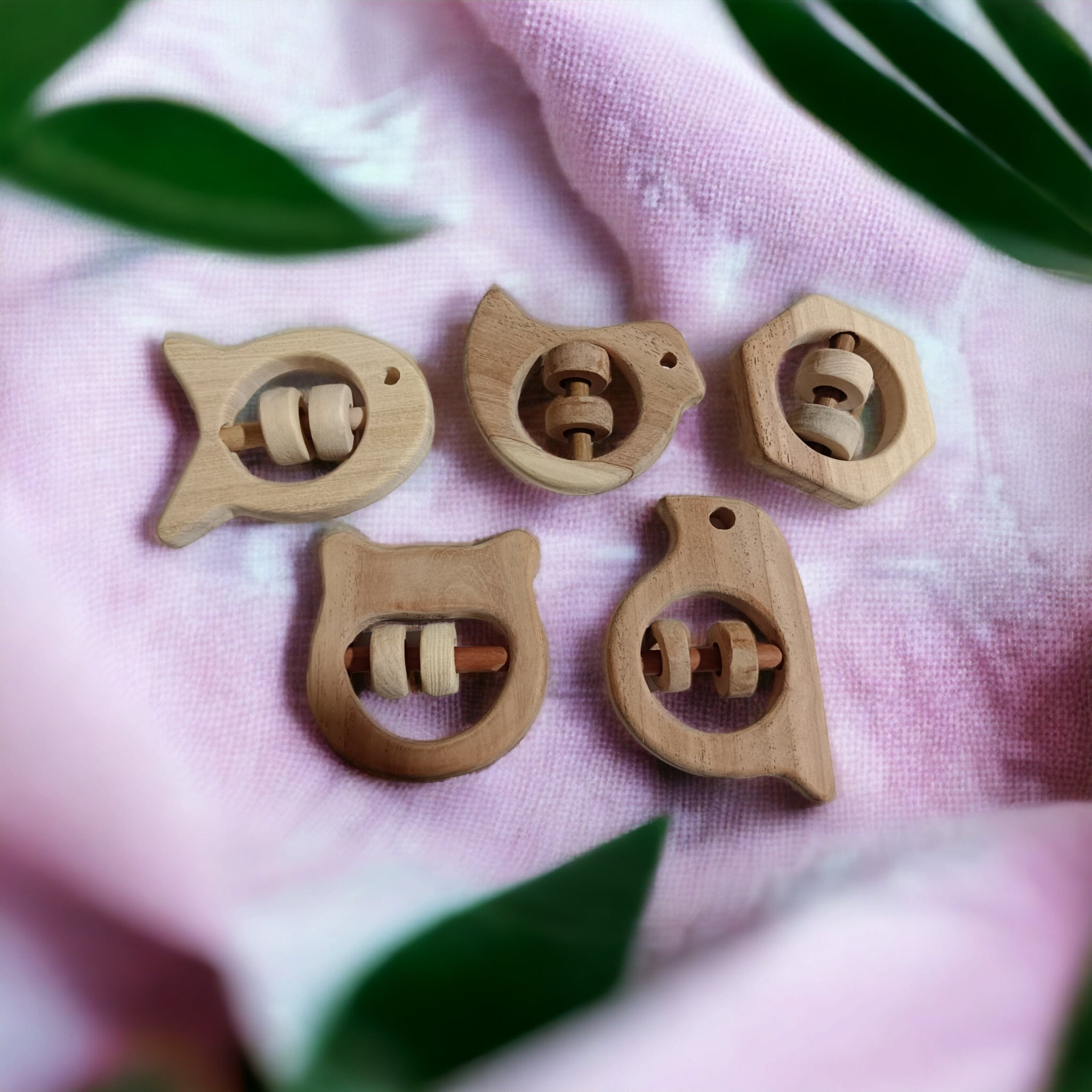 Soundmaking Rattles – Sparrow, Dove, Fish, Hippo & Hexagon Shapes – Baby Rattles on Brown Living™. SKU: R_SET5. Img 3.