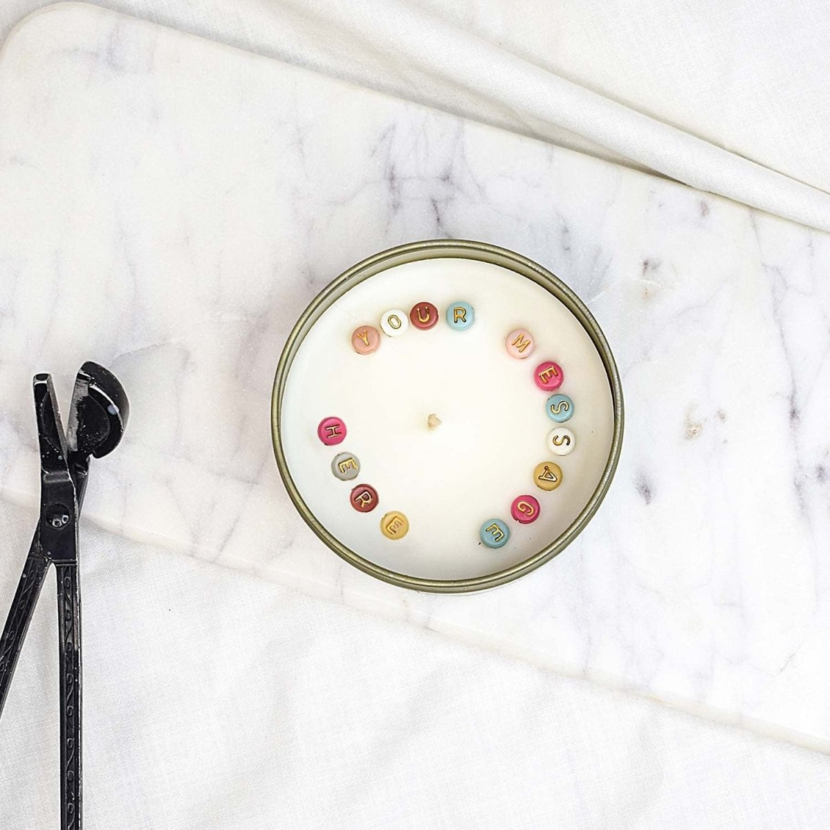 Secret Messege Scented Tin Candle – Candles & Fragrances on Brown Living™. SKU: ANCA053. Img 1.