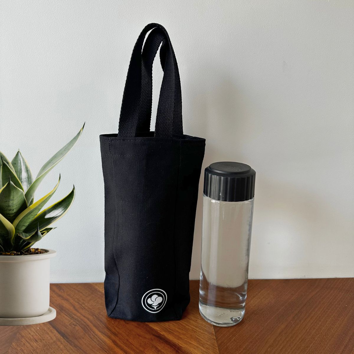 Single Bottle Holder – Eco Carry Pouch for Water Bottles – Tote Bag by The Gossy Shrub available on Brown Living™. Black . SKU: SBH006 (BLK). Img 6.