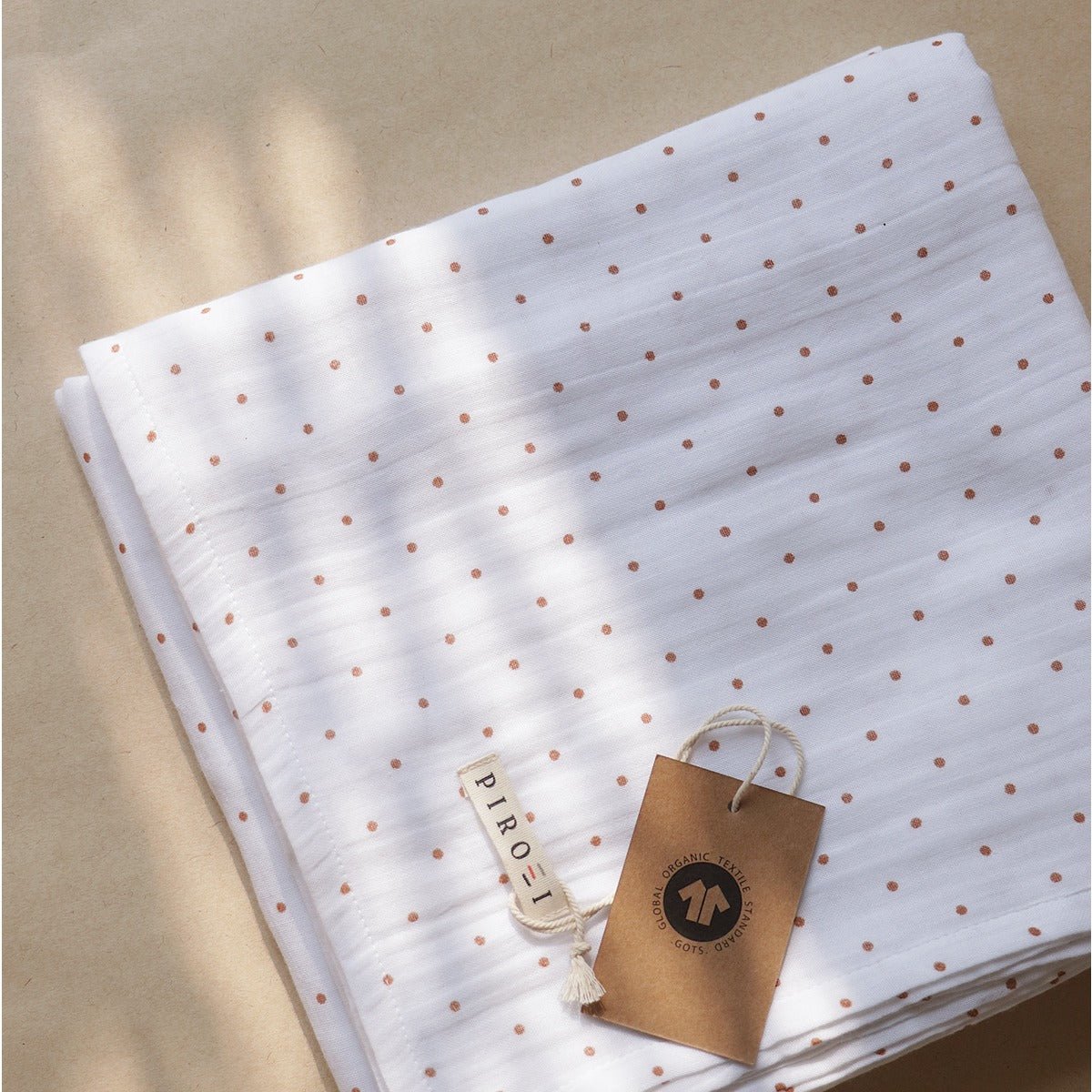 Spottie Dottie Organic Baby Swaddle – Little Cocoon Wrap – Baby Swaddle on Brown Living™. SKU: MM - 02 - 0003. Img 4.