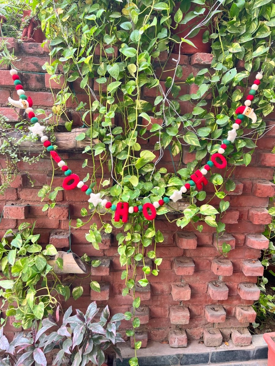 Upcycled Felt Ho - Ho Santa 3d Garland - 72 Inches – Decor & Artefacts on Brown Living™. SKU: SNHO01. Img 4.
