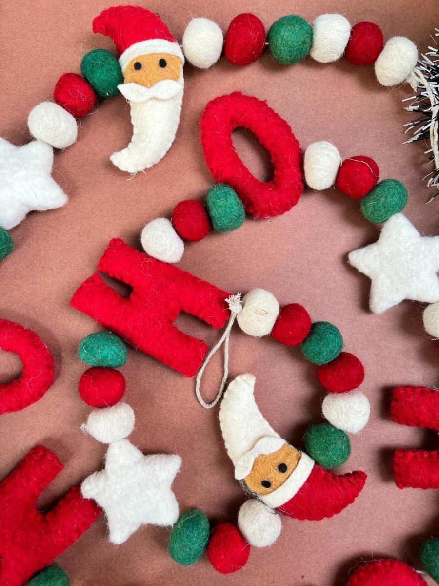 Upcycled Felt Ho - Ho Santa 3d Garland - 72 Inches – Decor & Artefacts on Brown Living™. SKU: SNHO01. Img 3.