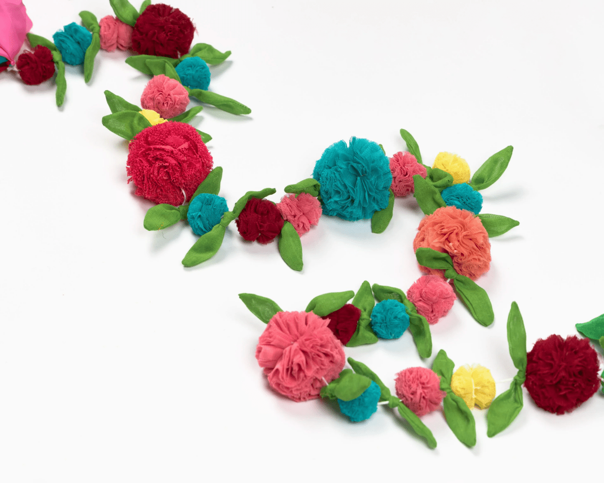 Upcycled Multicolor Flower Decorative Festive Garland String – Wall Decor on Brown Living™. SKU: UMW - FLOWER - STRING - 01. Img 2.