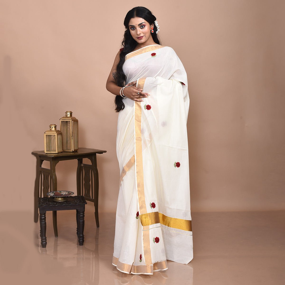 White Kerala Cotton Saree with Hand Embroidered Red Flowers – Womens Saree by Stotra available on Brown Living™. . SKU: STRCOTSARWHI08. Img 1.