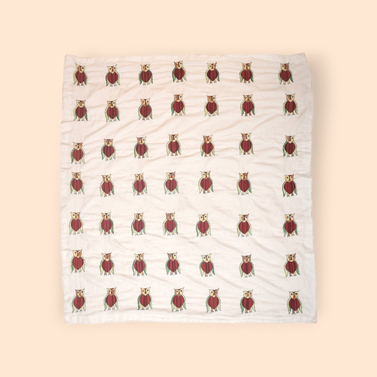 White Mulmul Hand Embroidered Baby Nakshi Kantha – Baby Swaddle on Brown Living™. SKU: ST - MUL - KAN - OWL - 01. Img 1.
