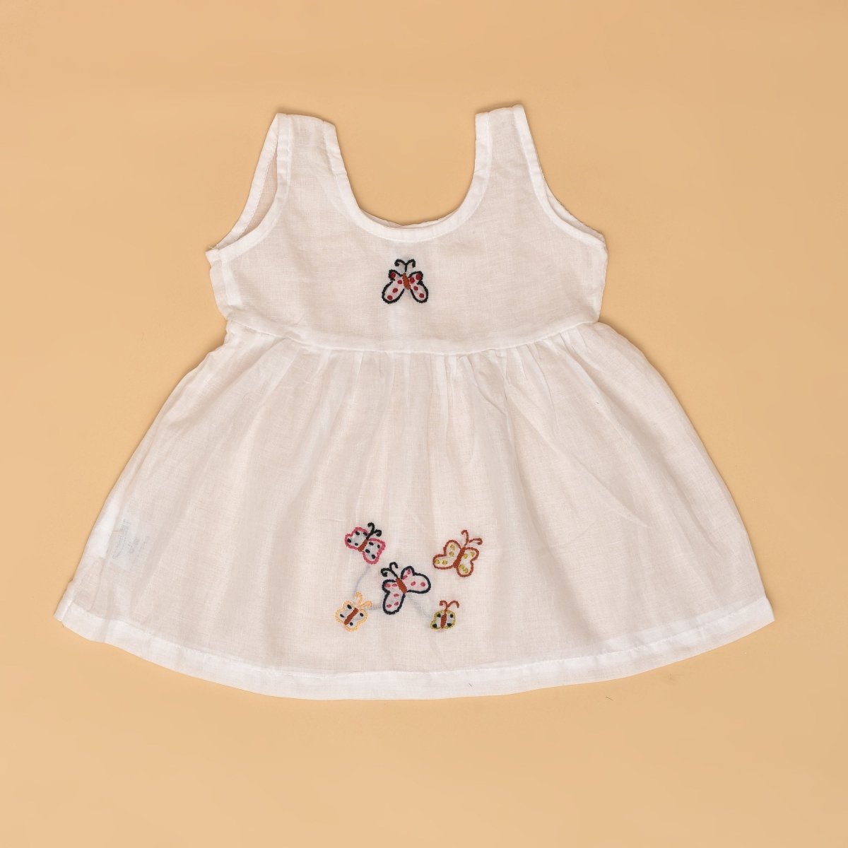White Pure Mulmul Hand Embroidered Baby Dress Combo - Set of 2 – Kids Frocks & Dresses on Brown Living™. SKU: STRCOTMULFROCOM03 - S. Img 4.