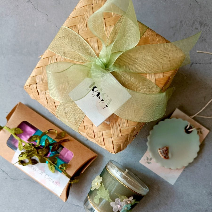 The Cozy Welcome Gift Set - Candle & Chocolate – Gift Hampers by Rasa Home available on Brown Living™. The Cozy Welcome Gift Set - Candle & Chocolate . SKU: TGBRGS07. Img 1.