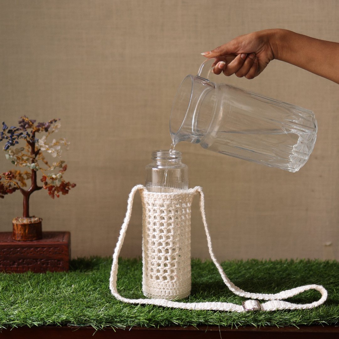 White Handmade Crochet Sling Bottle Cover – Bottles & Sippers by Sarmaya available on Brown Living™. . SKU: SAR109. Img 2.