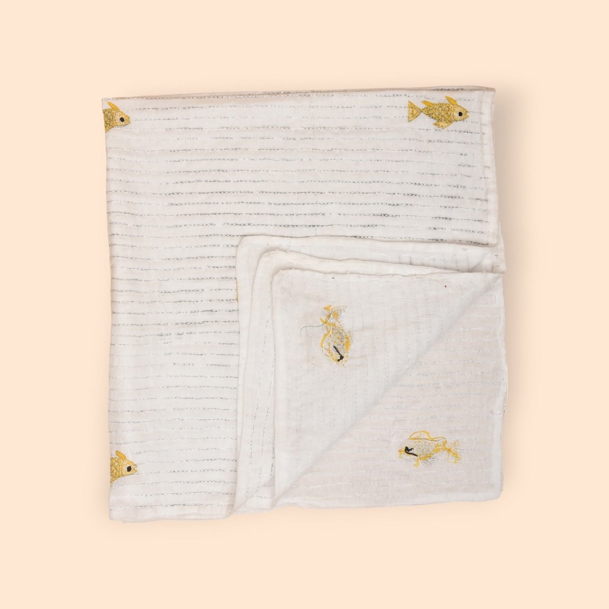 White Mulmul Fish Design Hand Embroidered Baby Nakshi Kantha – Baby Swaddle on Brown Living™. SKU: STRNAKFIS09-YELLOW. Img 15.