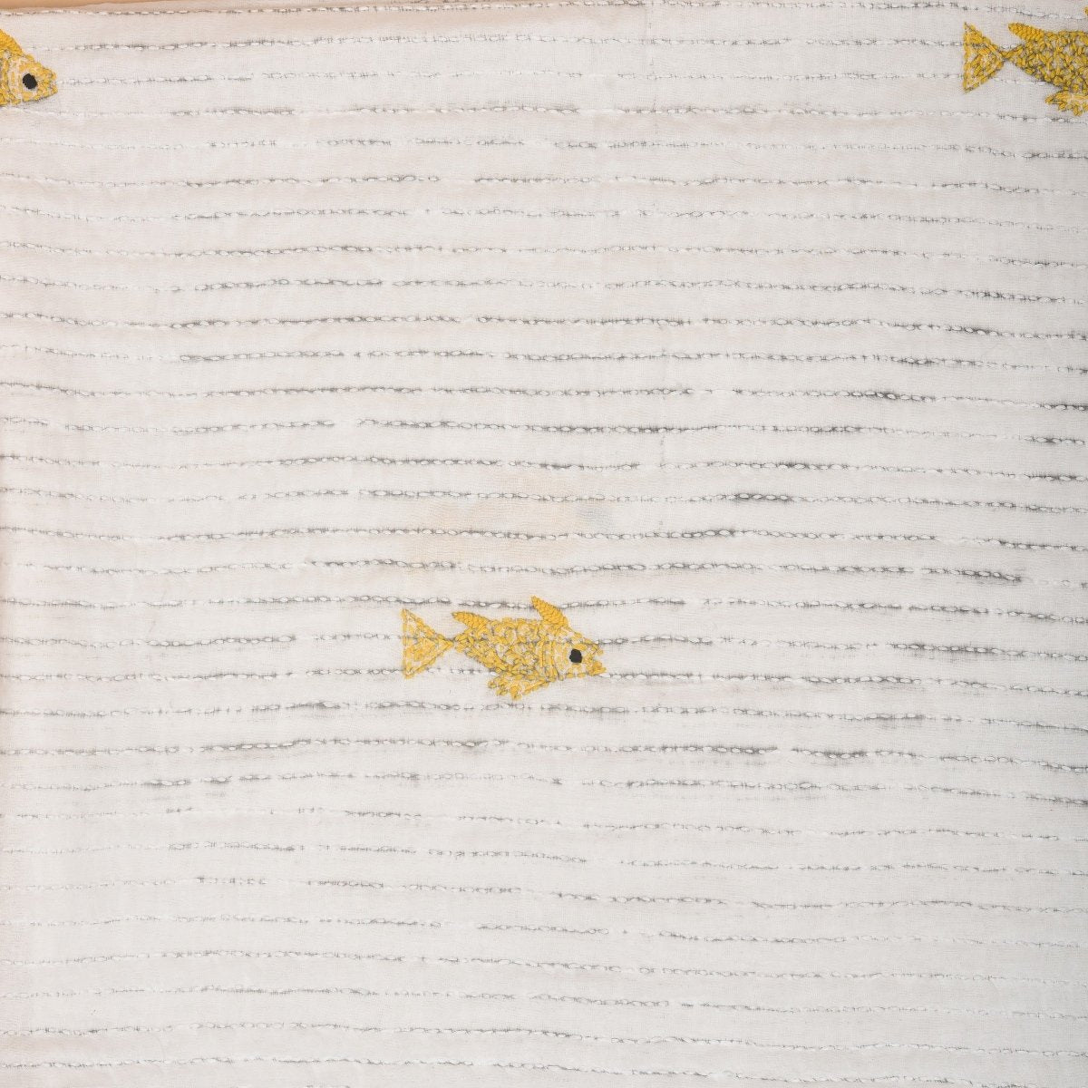 White Mulmul Fish Design Hand Embroidered Baby Nakshi Kantha – Baby Swaddle on Brown Living™. SKU: STRNAKFIS09-YELLOW. Img 17.