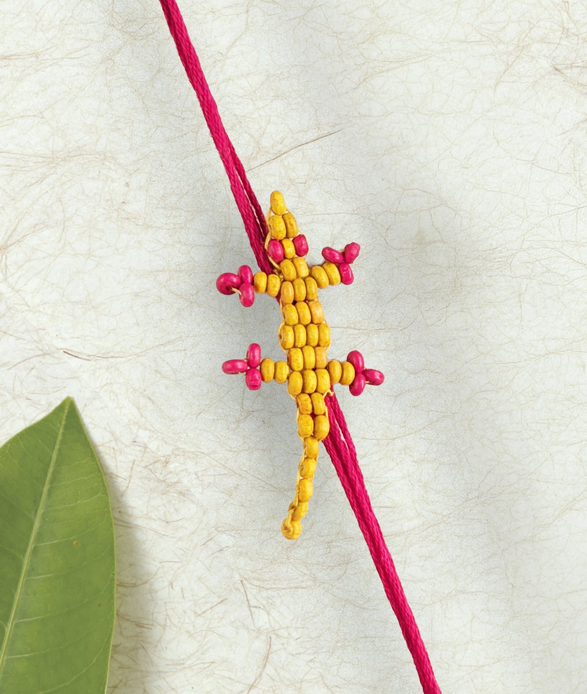 Yellow & White Chhipkali Rakhi Set of 2 – Rakhi on Brown Living™. SKU: GUL-19. Img 1.