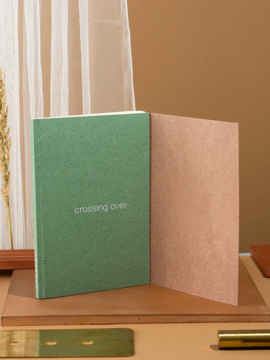Crossed Gridbook | Perfect bound hard cover, with a built - in envelope pocket at the back | Verified Sustainable by Brown Living™