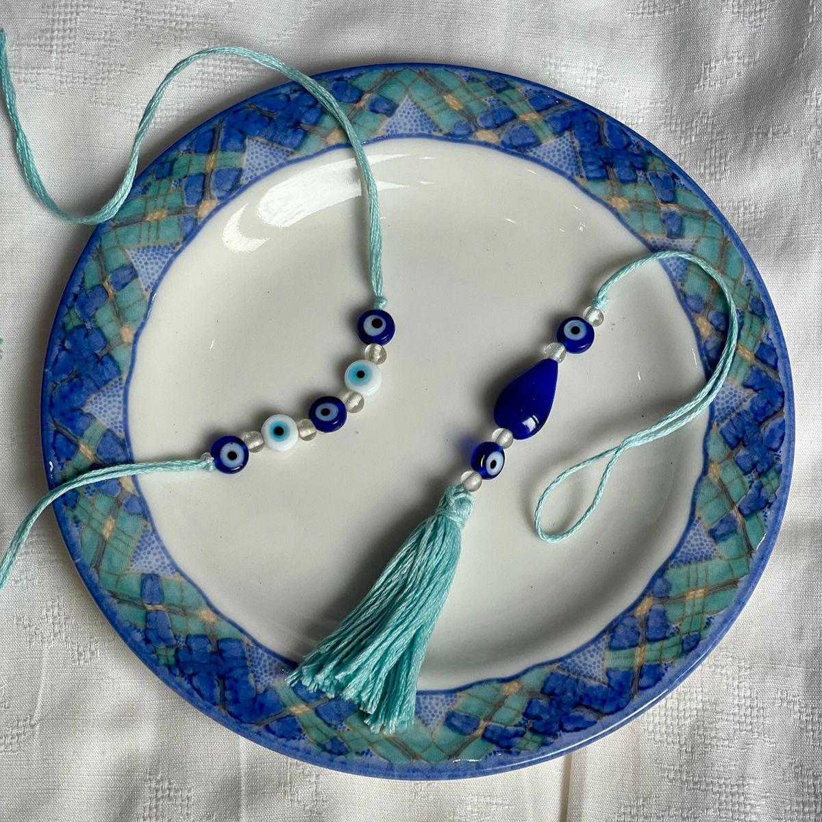 Evil Eye Rakhi & Lumba Set – Rakhi on Brown Living™. SKU: GRERA08. Img 1.