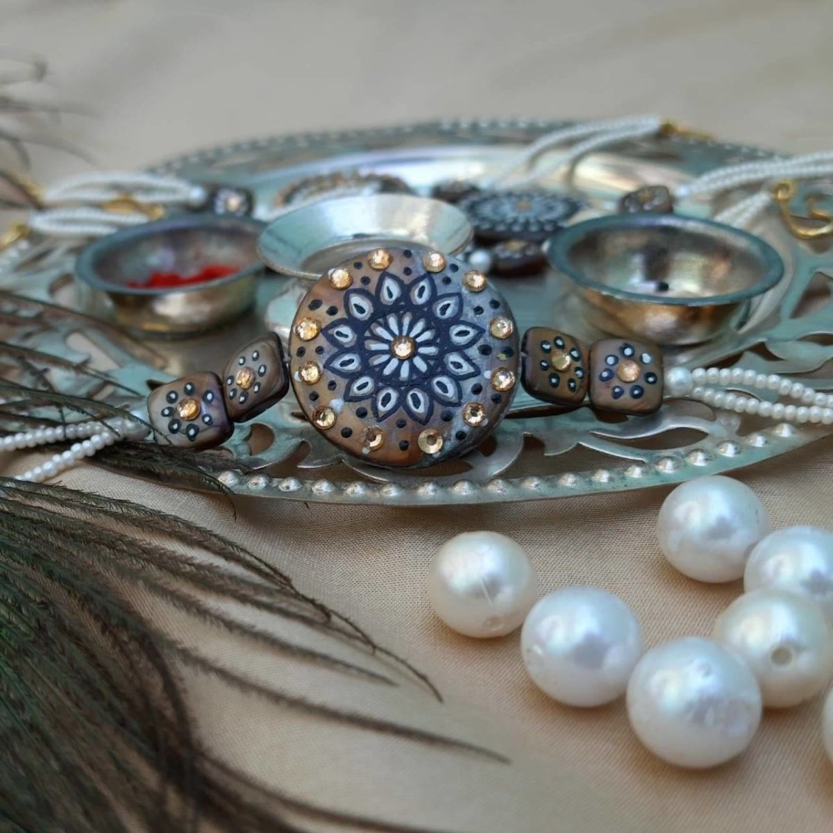 Hand painted pearl shell rakhi | Verified Sustainable by Brown Living™