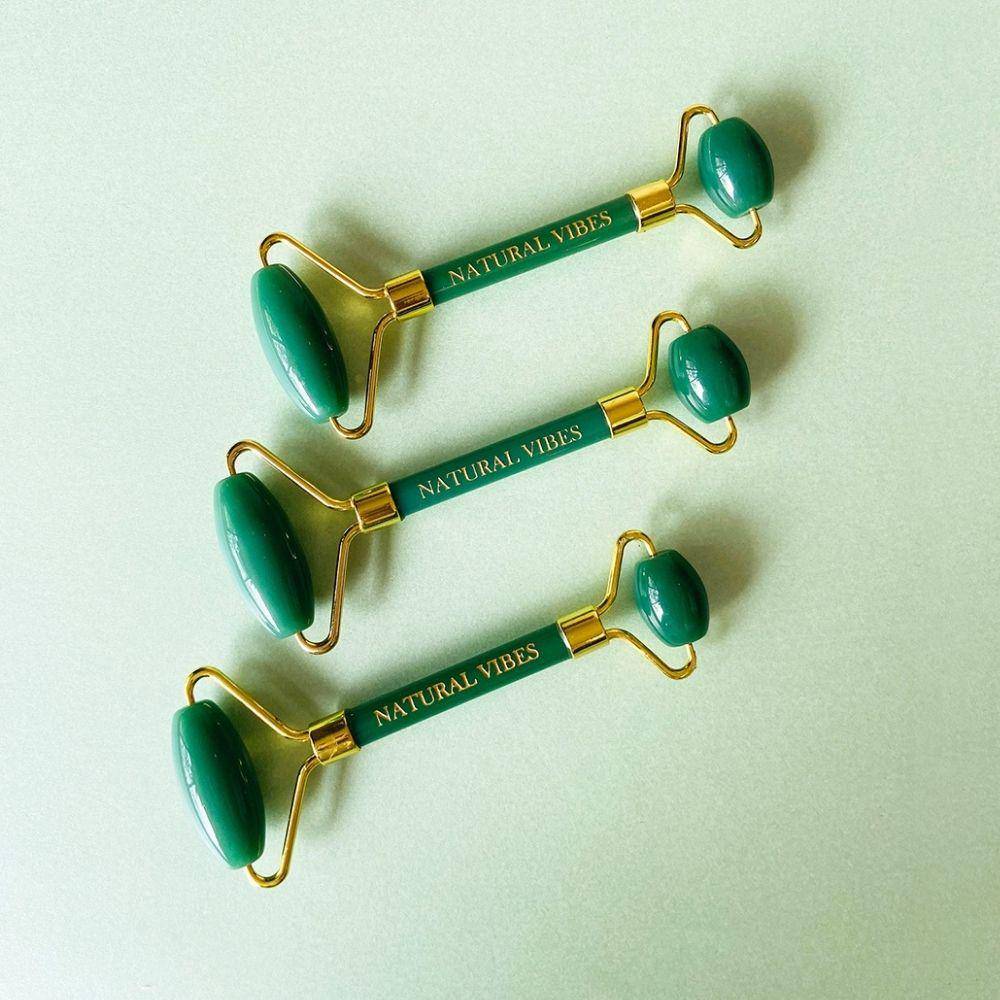 Jade Roller & Massager with FREE Gold Beauty Elixir Oil – Massager by Natural Vibes available on Brown Living™. . SKU: 063 - 05469 - NV_Jade_Green_Roller_oil. Img 8.