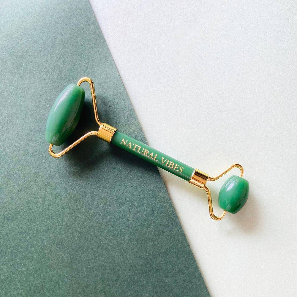 Jade Roller & Massager with FREE Gold Beauty Elixir Oil – Massager by Natural Vibes available on Brown Living™. . SKU: 063 - 05469 - NV_Jade_Green_Roller_oil. Img 9.