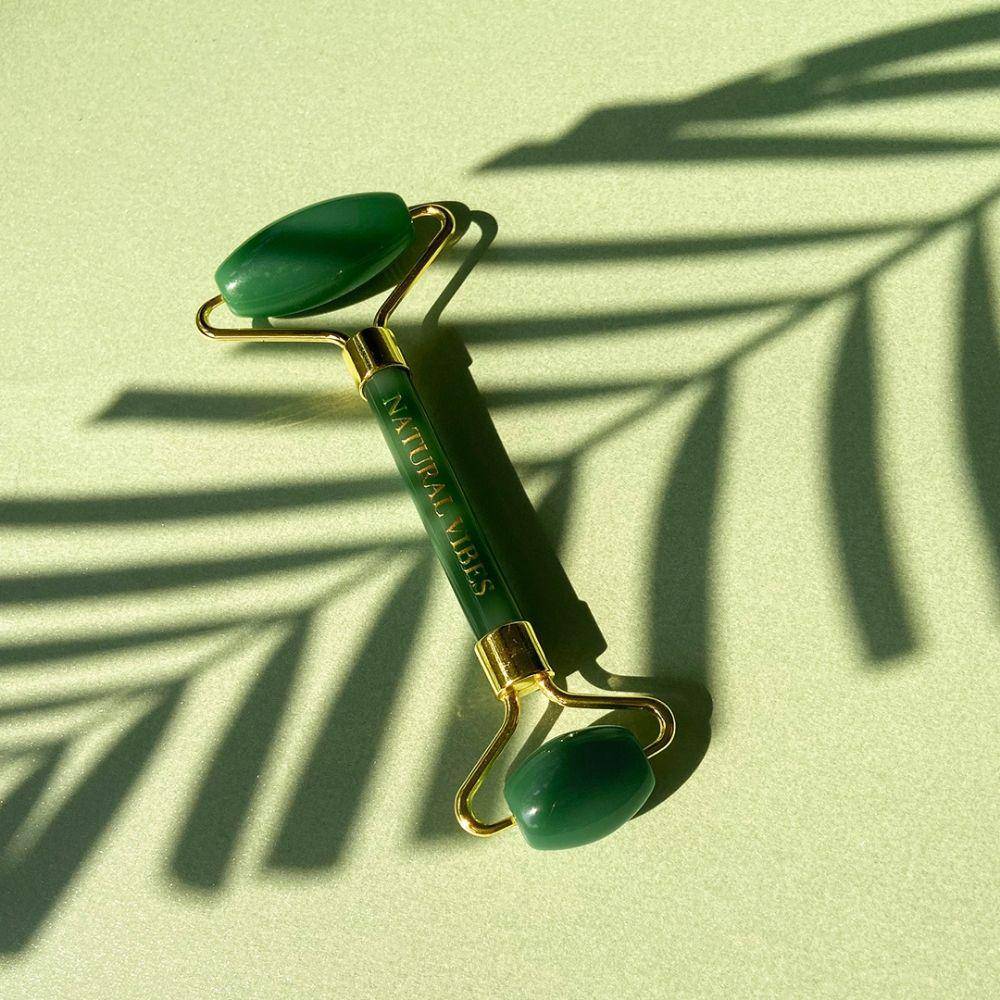 Jade Roller & Massager with FREE Gold Beauty Elixir Oil – Massager by Natural Vibes available on Brown Living™. . SKU: 063 - 05469 - NV_Jade_Green_Roller_oil. Img 7.